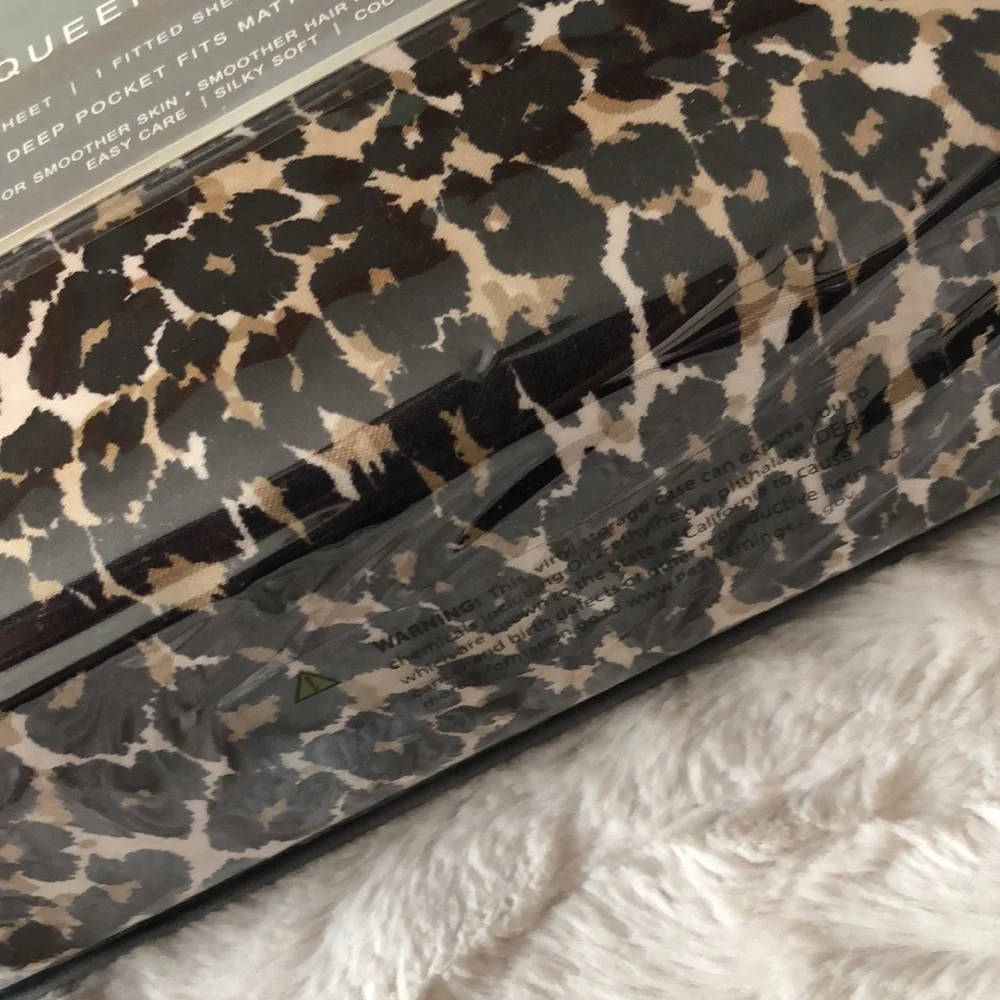 Nicole Miller brand satin includes